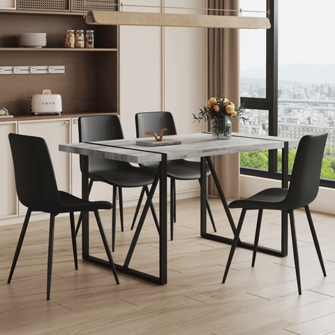 Table and chair set.A minimalist retro rectangular dining table with a specially textured top and black metal legs.Paired With 4 Black Artificial PU Chairs With Curved Widened Cushion Design.