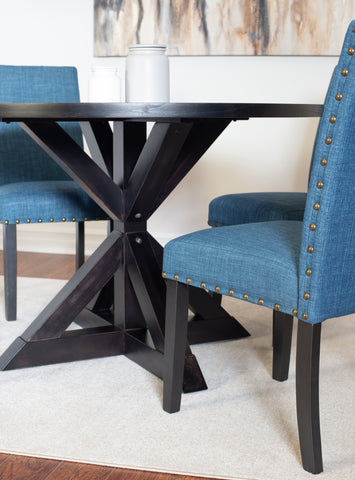 Mytzi 5-Piece Round Dining Set: Black Oak Veneer Table with Cross-Buck Base & 4 Blue Linen Chairs, Brass Nailheads, Seats 4, Durable Rubberwood Frame, Perfect for Dining Room & Kitchen