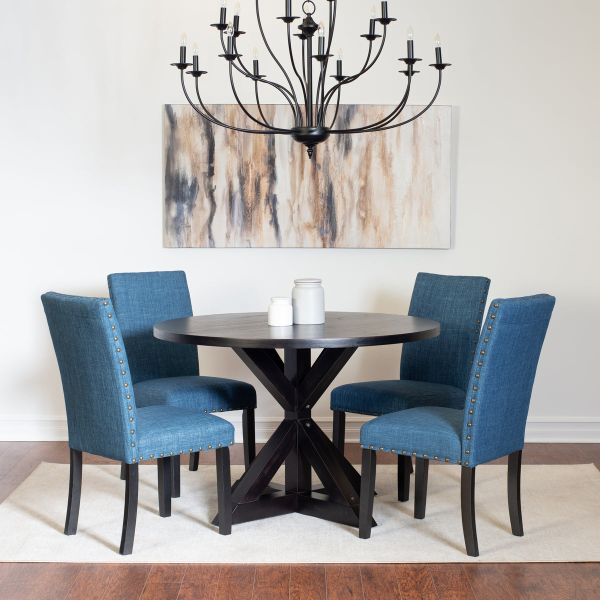 Mytzi 5-Piece Round Dining Set: Black Oak Veneer Table with Cross-Buck Base & 4 Blue Linen Chairs, Brass Nailheads, Seats 4, Durable Rubberwood Frame, Perfect for Dining Room & Kitchen